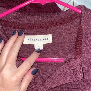 A men’s Aeropostale shirt.